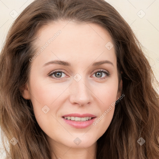 Joyful white young-adult female with long  brown hair and blue eyes