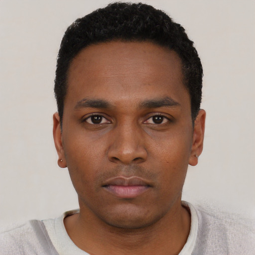 Neutral black young-adult male with short  black hair and brown eyes