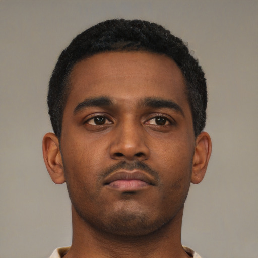 Neutral black young-adult male with short  black hair and brown eyes