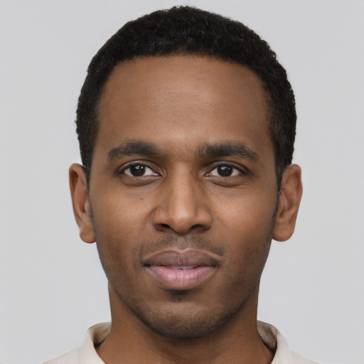 Neutral black young-adult male with short  black hair and brown eyes