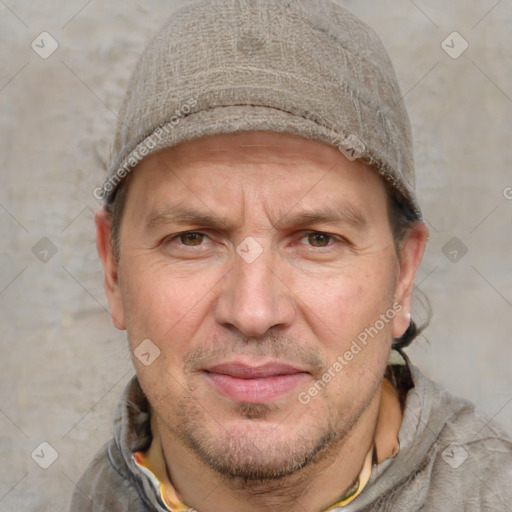 Joyful white adult male with short  brown hair and grey eyes