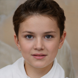 Joyful white child female with short  brown hair and brown eyes