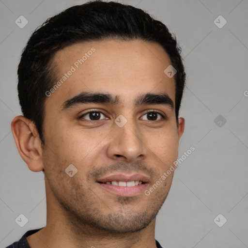 Joyful latino young-adult male with short  brown hair and brown eyes