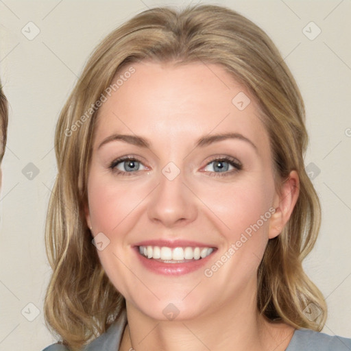 Joyful white young-adult female with medium  brown hair and blue eyes