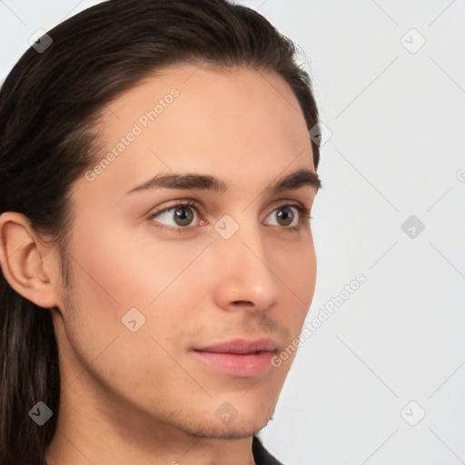 Neutral white young-adult male with long  brown hair and brown eyes