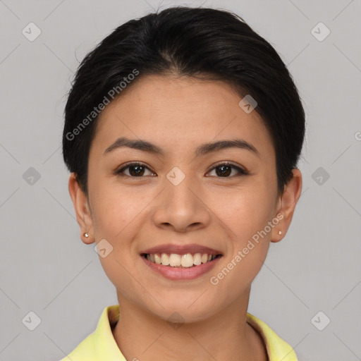 Joyful asian young-adult female with short  brown hair and brown eyes