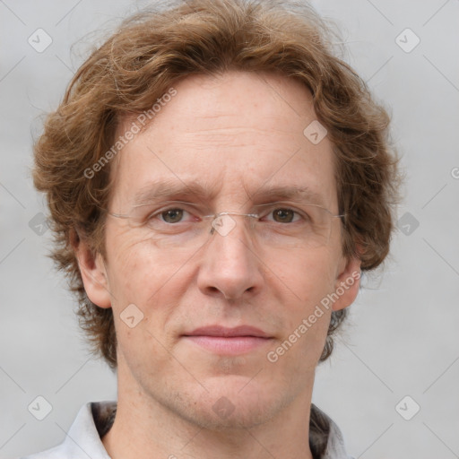 Joyful white adult male with short  brown hair and grey eyes