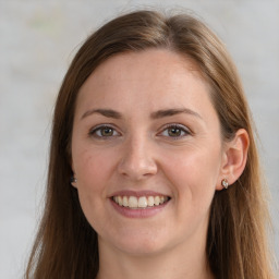 Joyful white young-adult female with long  brown hair and grey eyes