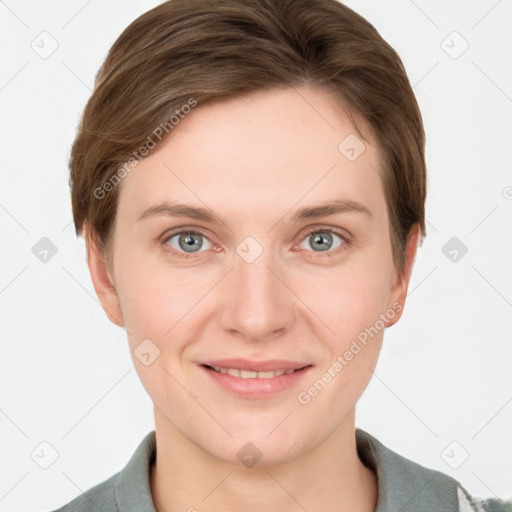 Joyful white young-adult female with short  brown hair and grey eyes