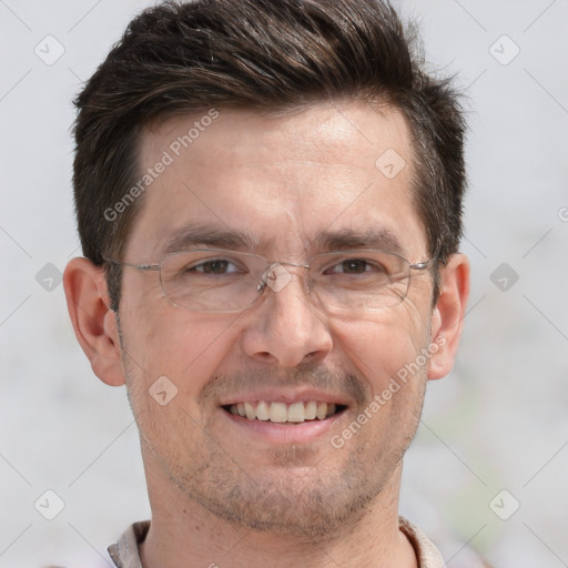 Joyful white adult male with short  brown hair and grey eyes