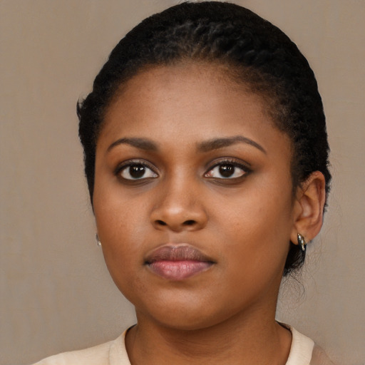 Neutral black young-adult female with short  black hair and brown eyes