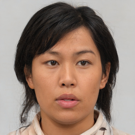 Neutral asian young-adult female with medium  brown hair and brown eyes