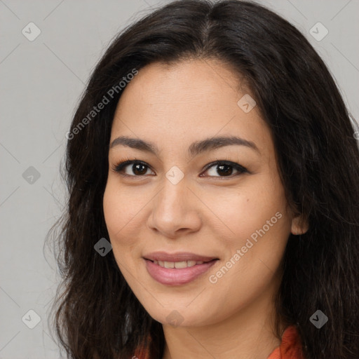 Joyful asian young-adult female with long  brown hair and brown eyes