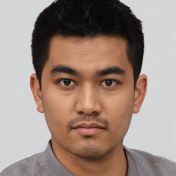 Neutral asian young-adult male with short  black hair and brown eyes