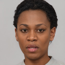 Neutral black young-adult female with short  black hair and brown eyes