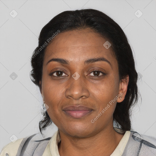 Joyful black adult female with medium  black hair and brown eyes