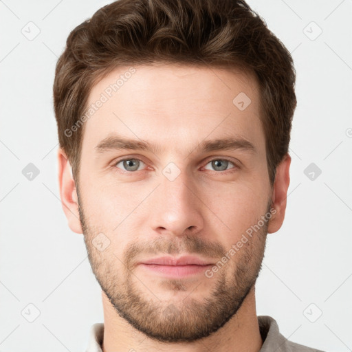 Neutral white young-adult male with short  brown hair and grey eyes