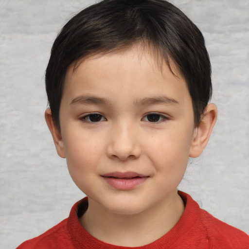 Joyful asian child female with short  brown hair and brown eyes