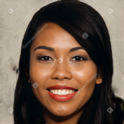 Joyful latino young-adult female with long  black hair and brown eyes