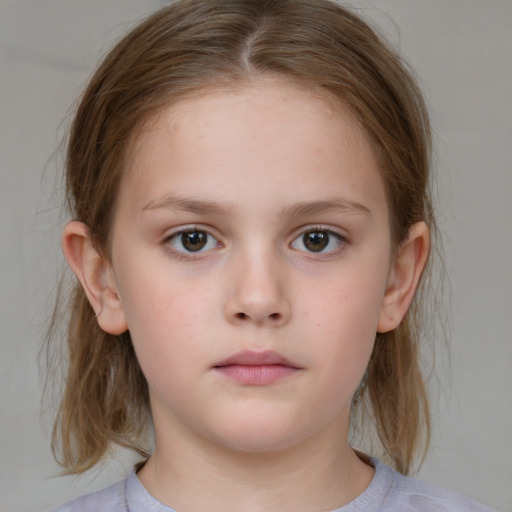 Neutral white child female with medium  brown hair and brown eyes