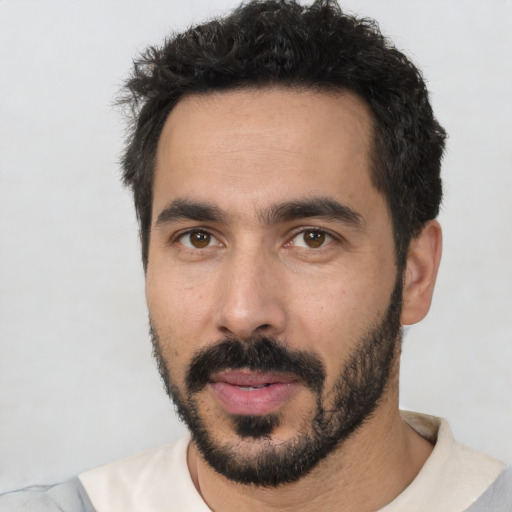 Neutral white young-adult male with short  black hair and brown eyes