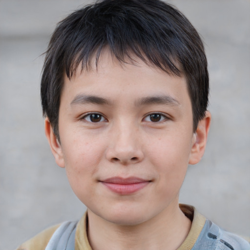 Joyful white child male with short  brown hair and brown eyes