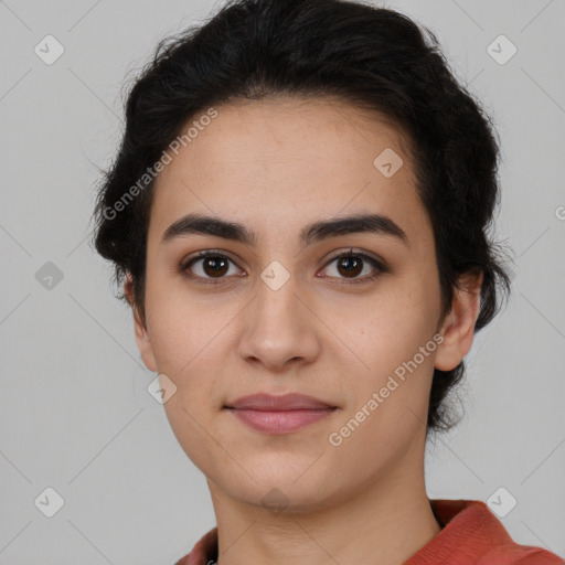 Joyful latino young-adult female with short  black hair and brown eyes