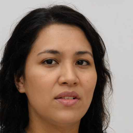 Neutral latino young-adult female with long  brown hair and brown eyes