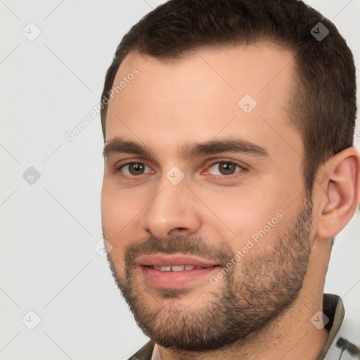 Joyful white young-adult male with short  brown hair and brown eyes