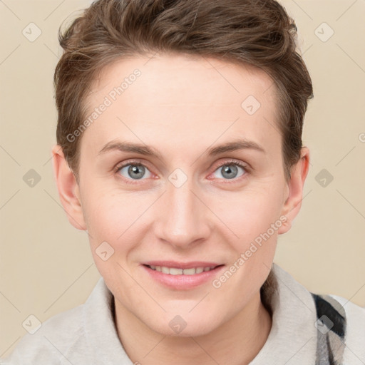 Joyful white young-adult female with short  brown hair and grey eyes