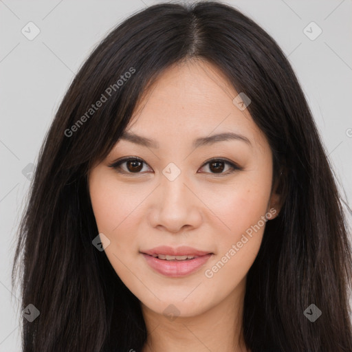 Joyful asian young-adult female with long  brown hair and brown eyes