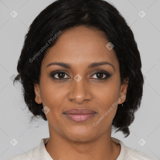 Joyful black young-adult female with medium  black hair and brown eyes