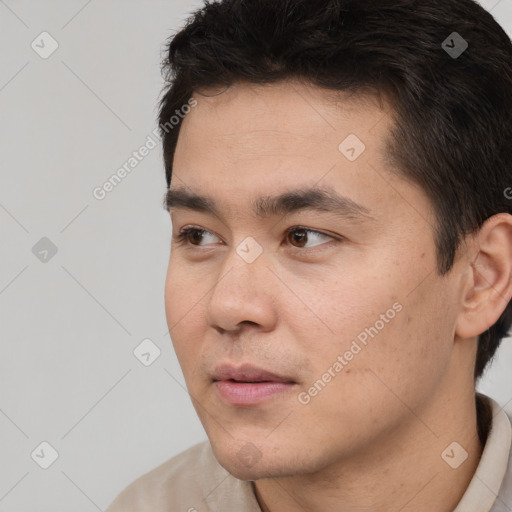 Neutral white young-adult male with short  black hair and brown eyes