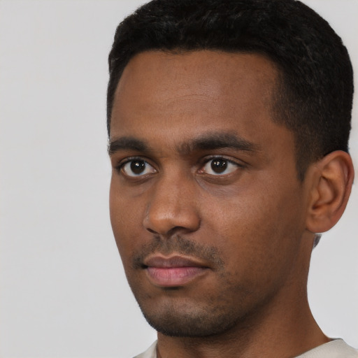 Neutral black young-adult male with short  black hair and brown eyes