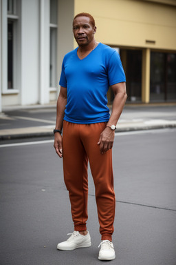 Jamaican middle-aged male with  ginger hair