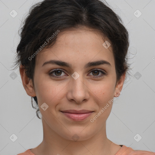 Joyful white young-adult female with short  brown hair and brown eyes