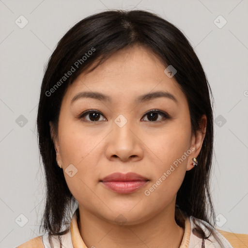 Joyful asian young-adult female with medium  brown hair and brown eyes