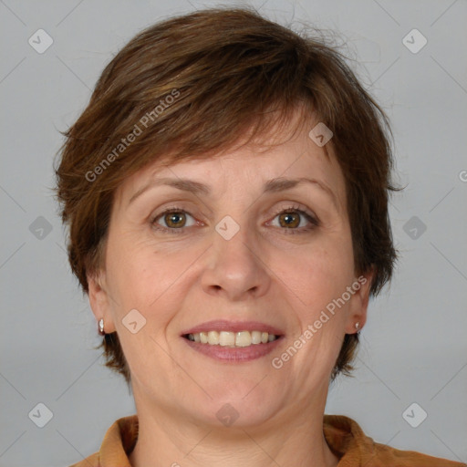 Joyful white adult female with medium  brown hair and brown eyes