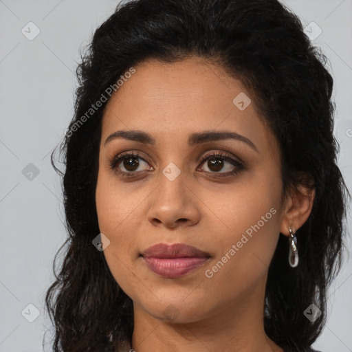 Joyful latino young-adult female with long  brown hair and brown eyes