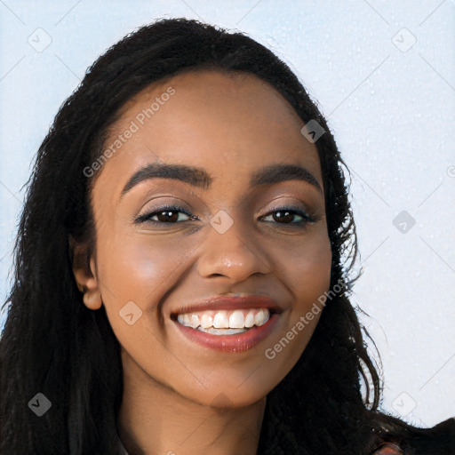 Joyful latino young-adult female with long  black hair and brown eyes