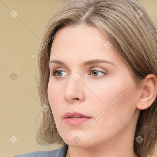 Neutral white young-adult female with medium  brown hair and grey eyes