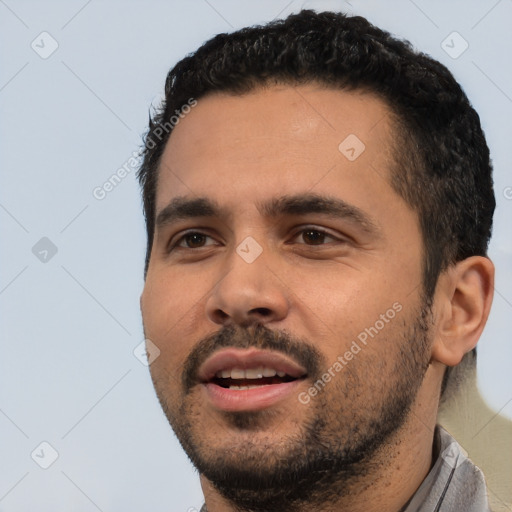 Neutral white young-adult male with short  black hair and brown eyes