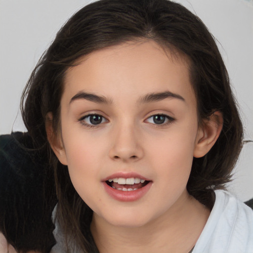 Joyful white child female with medium  brown hair and brown eyes