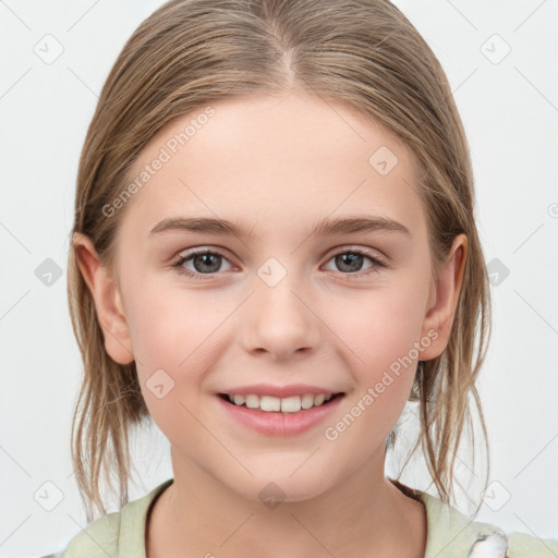 Joyful white child female with medium  brown hair and grey eyes