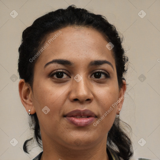 Joyful latino young-adult female with short  brown hair and brown eyes