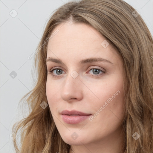 Neutral white young-adult female with long  brown hair and blue eyes