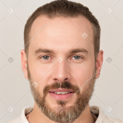 Joyful white young-adult male with short  brown hair and brown eyes