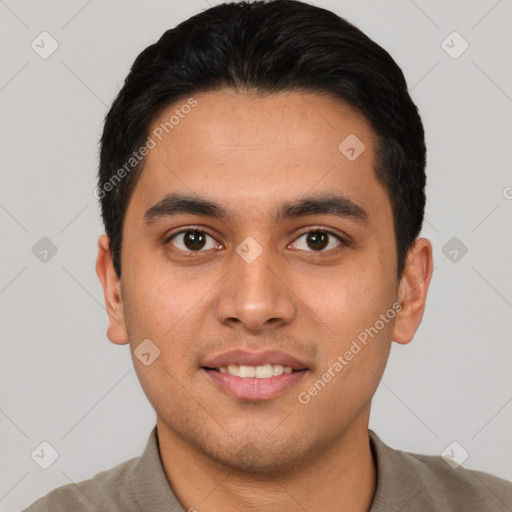 Joyful asian young-adult male with short  brown hair and brown eyes