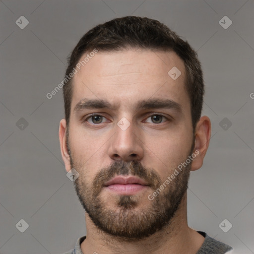 Neutral white young-adult male with short  brown hair and brown eyes