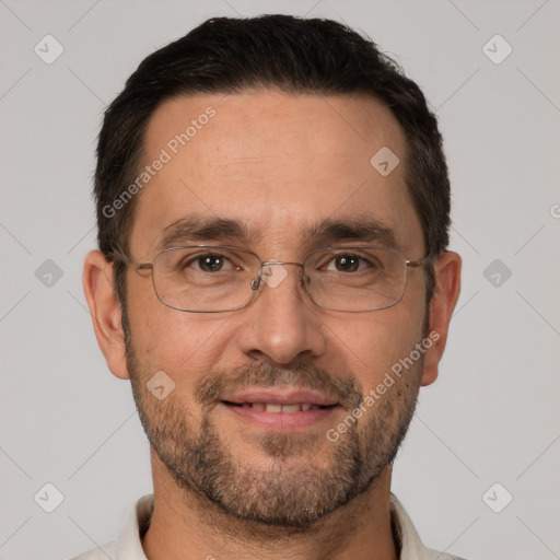 Joyful white adult male with short  brown hair and brown eyes